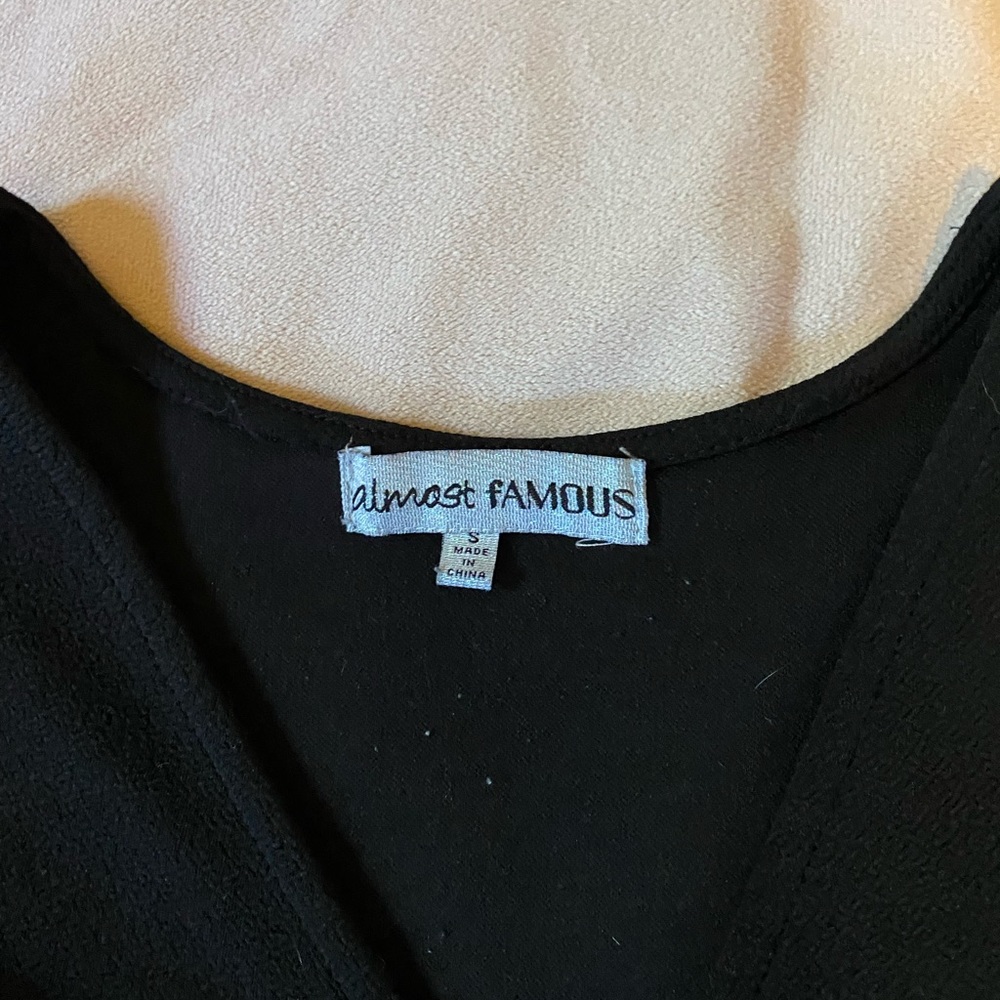 Almost face black and white racer mini dress